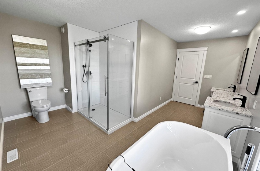 Double shower. Contemporary black hardware.