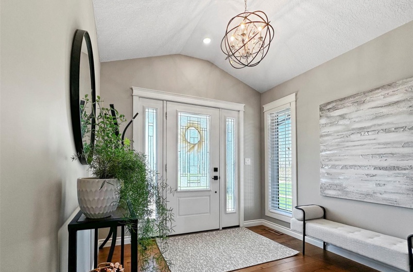 Upon entry you are greeted by a soothing paint palette and transitional decor. The warm maple hardwood is gleaming without a scratch, an indication of the pristine condition of the entire home.