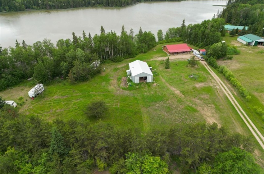 Aerial view featuring a rural view and a water view