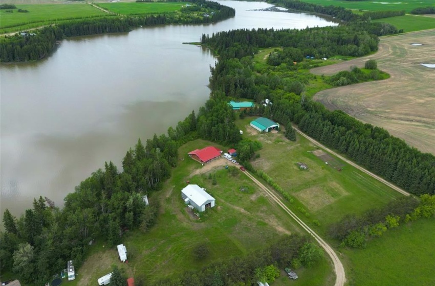 Aerial view featuring a rural view and a water view