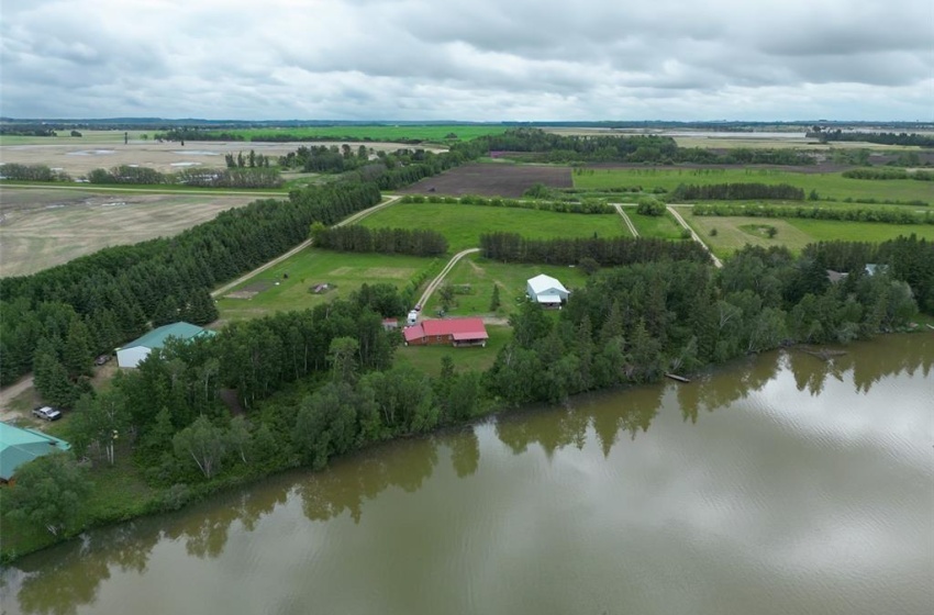 Aerial view featuring a rural view and a water view