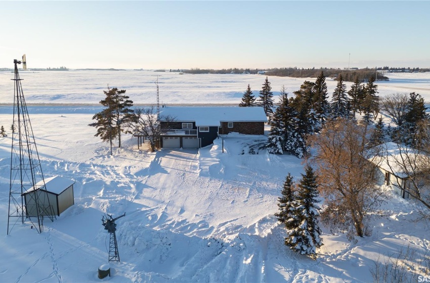 Snowy aerial view with a rural view