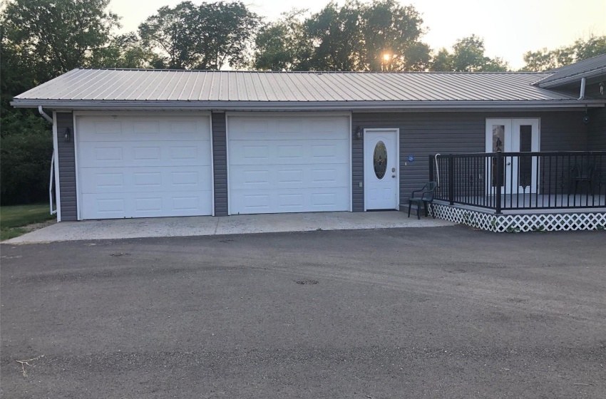 View of front of house with a deck