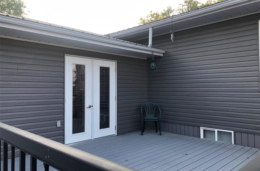 Wooden terrace with french doors