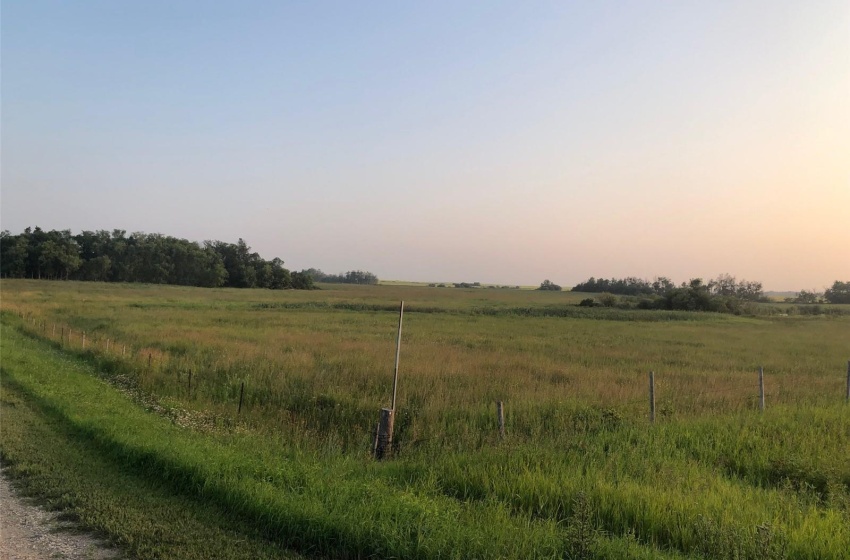 Nature at dusk featuring a rural view