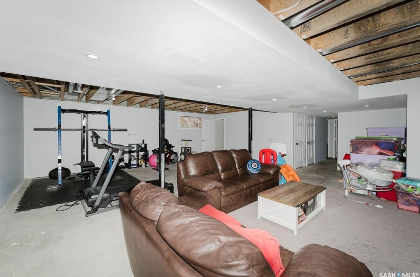 Living room with concrete flooring