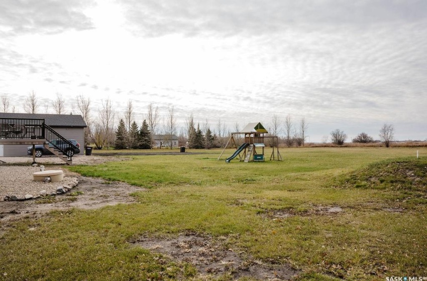 View of yard featuring a playground