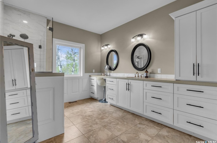 Bathroom featuring tile floors and vanity