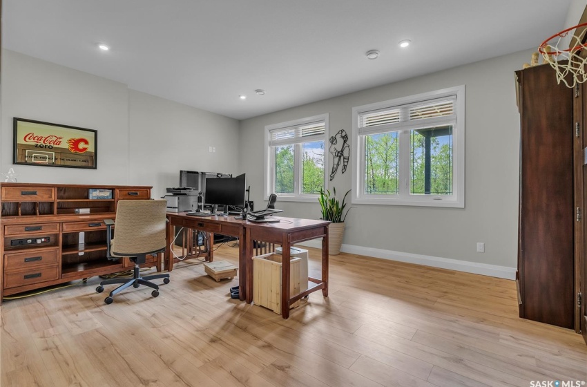 Office featuring laminate plank flooring