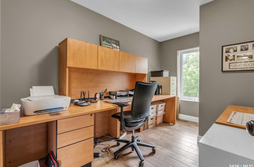 Office area featuring built in desk