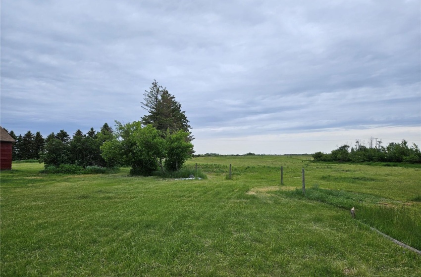 View of yard with a rural view