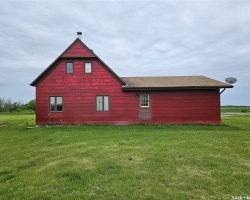 View of home's exterior featuring a lawn