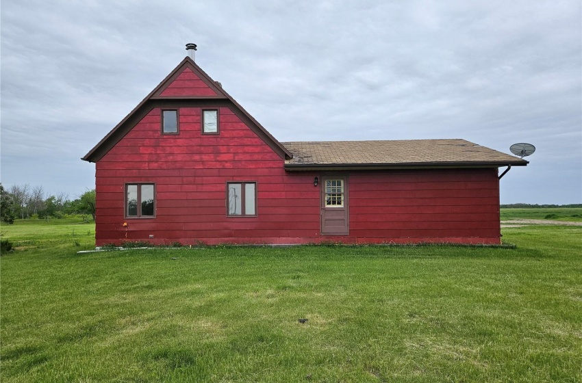 View of home's exterior featuring a lawn