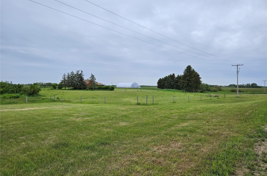 View of yard with a rural view