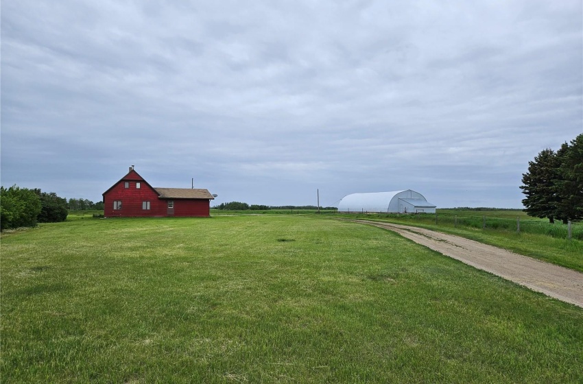 View of yard with a rural view