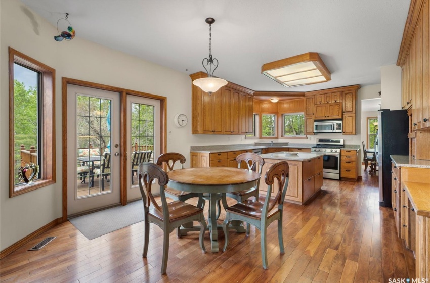 Dining area featuring hardwood / wood-style floors