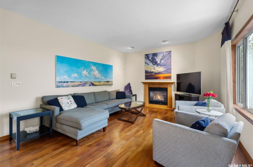 Living room with wood-type flooring