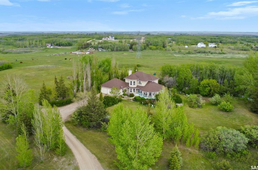 Birds eye view of property with a rural view