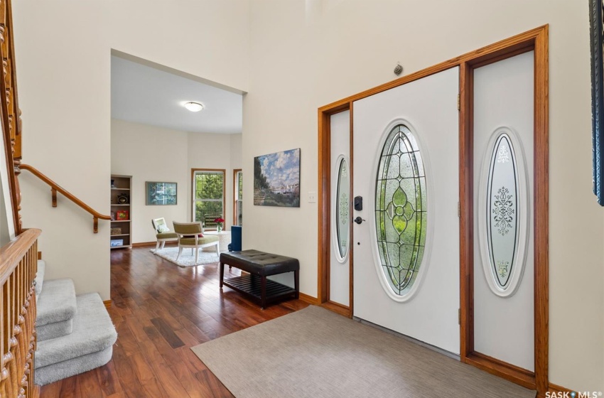 Foyer entrance featuring dark hardwood / wood-style flooring