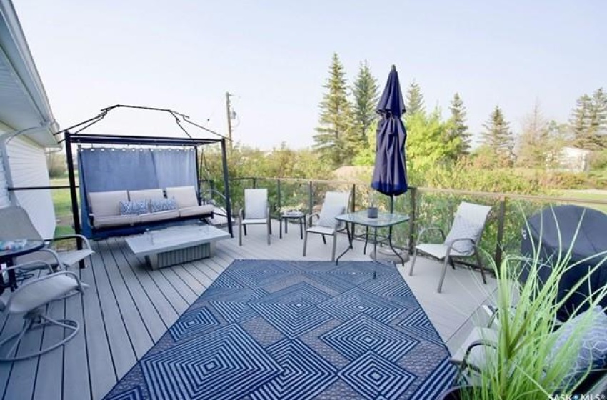 Wooden terrace featuring outdoor lounge area and a gazebo