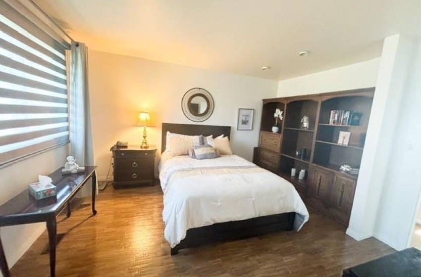 Bedroom featuring hardwood / wood-style flooring