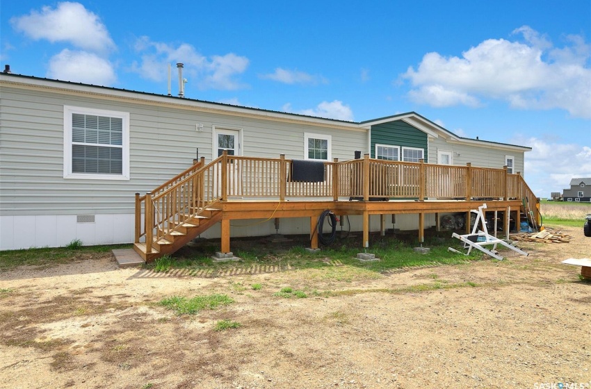 Back of house featuring a deck