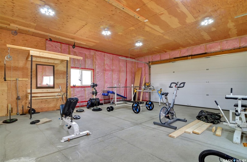 Workout room featuring concrete floors