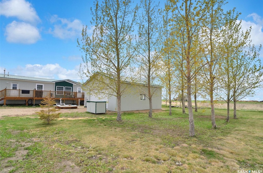 View of yard with a wooden deck