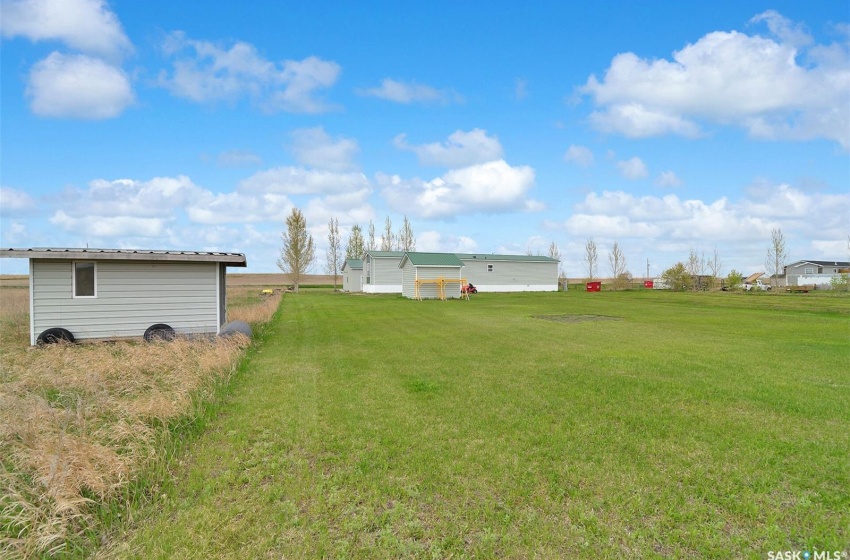 View of yard with a shed