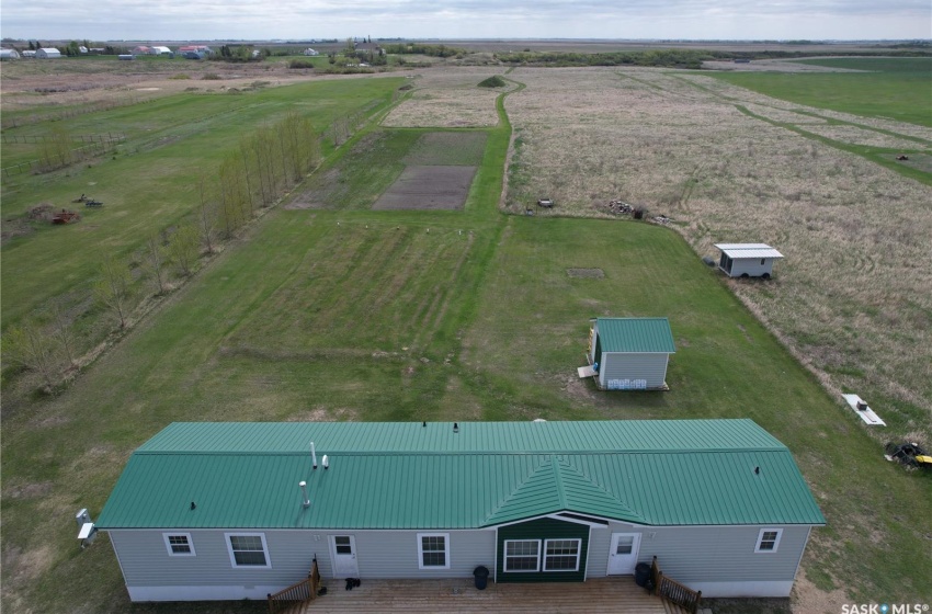 Birds eye view of property with a rural view