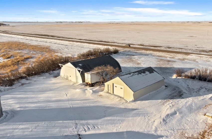 Snowy aerial view with a rural view