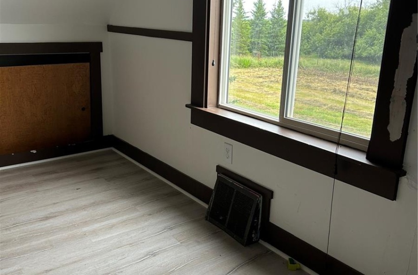 Additional living space featuring light hardwood / wood-style floors