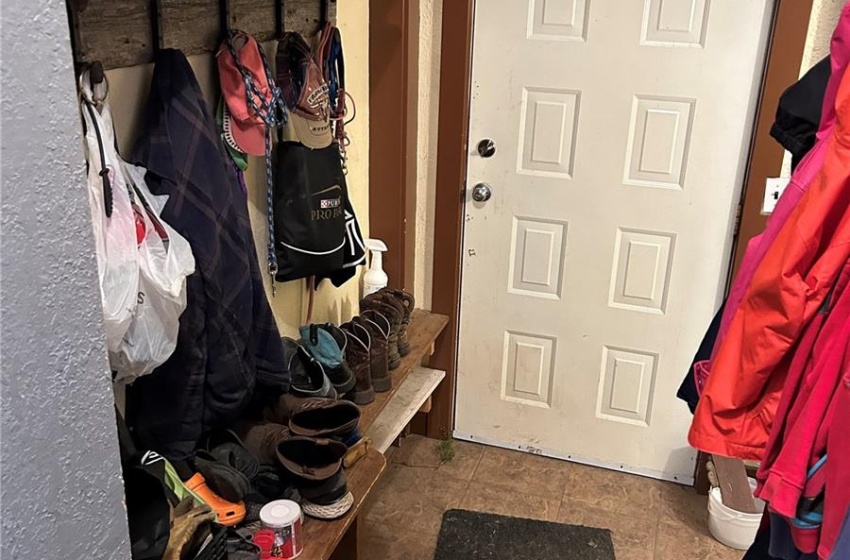 Mudroom featuring tile patterned flooring