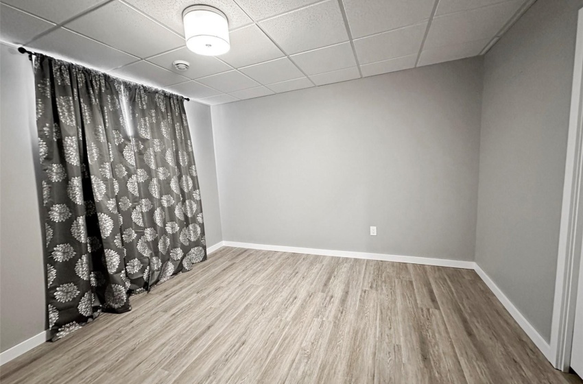 One of three basement bedrooms.