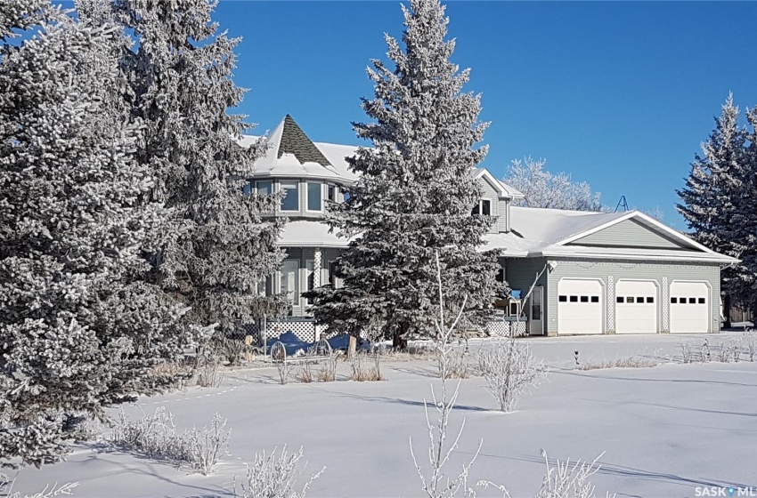 View of front of property with a garage