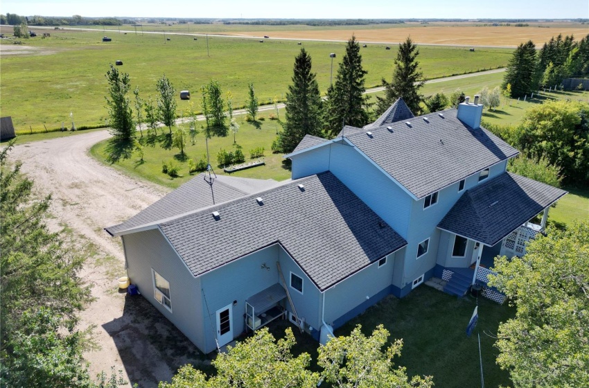 Birds eye view of property with a rural view