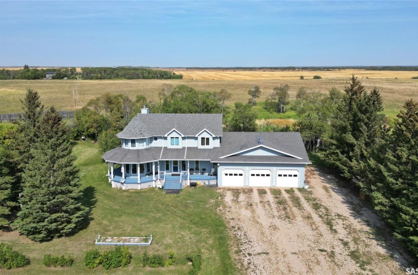 Birds eye view of property with a rural view