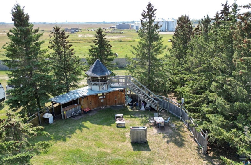 Birds eye view of property with a rural view