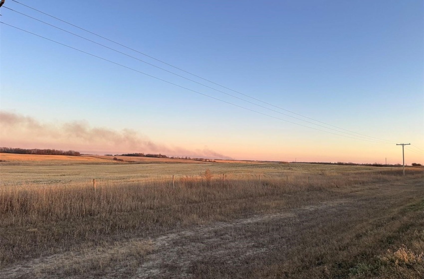 Nature at dusk featuring a rural view