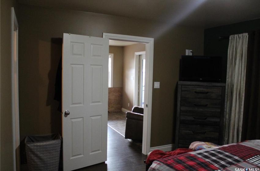 Bedroom featuring dark hardwood / wood-style flooring