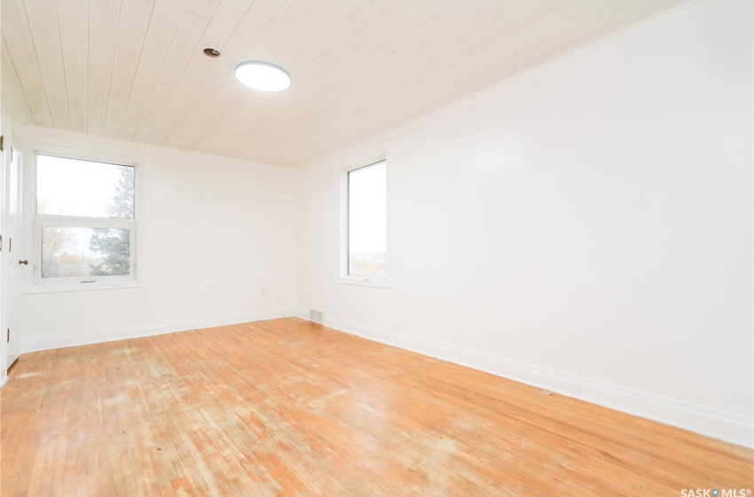 Spare room featuring light wood-type flooring