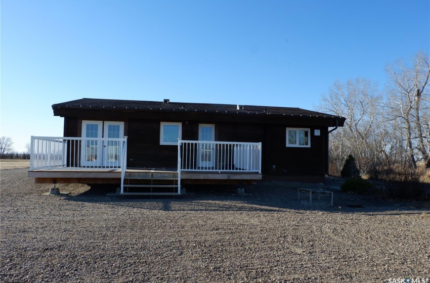 Rear view of property with a deck