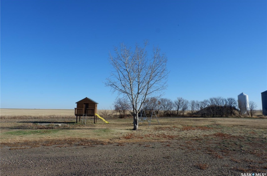 View of yard featuring a playground and a rural view