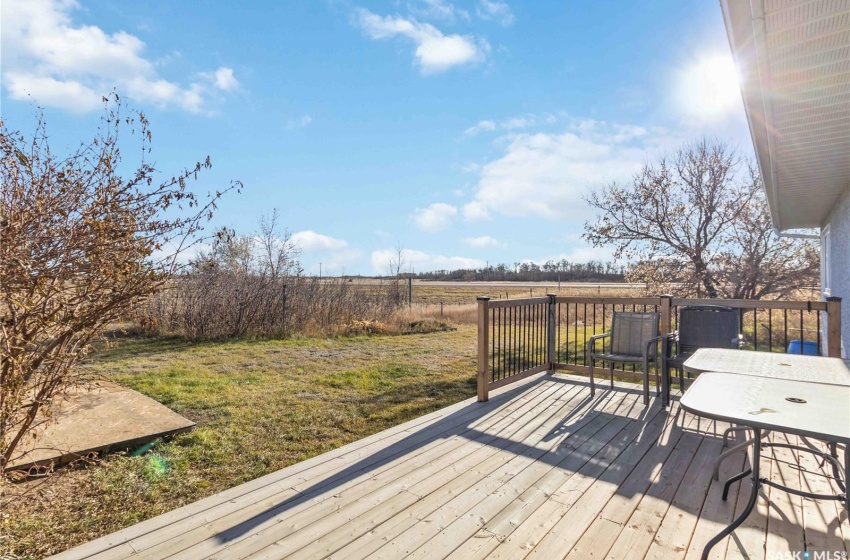 Deck featuring a lawn