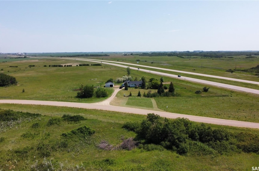 Birds eye view of property with a rural view