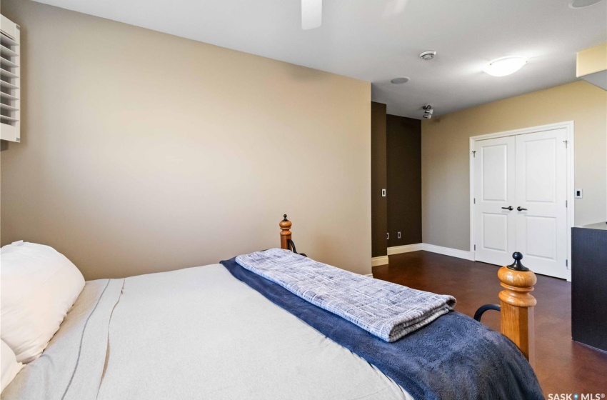 Bedroom featuring a closet and ceiling fan