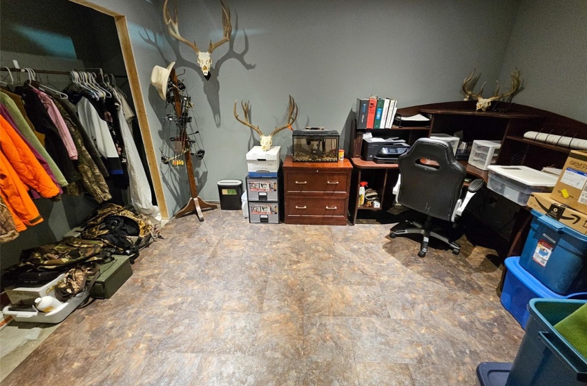 Office area with a paneled ceiling