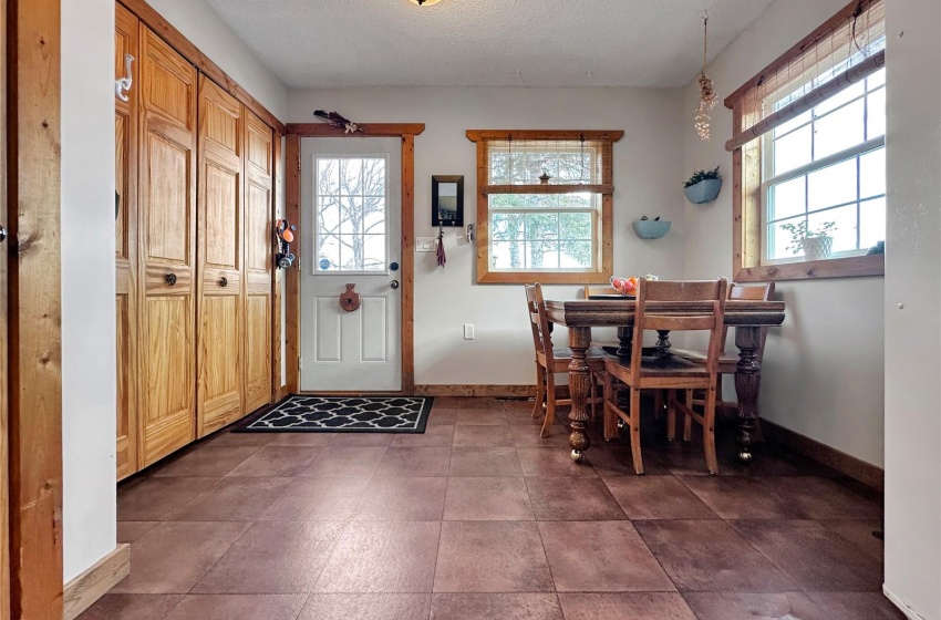 Entry from East facing wrapped porch deck door