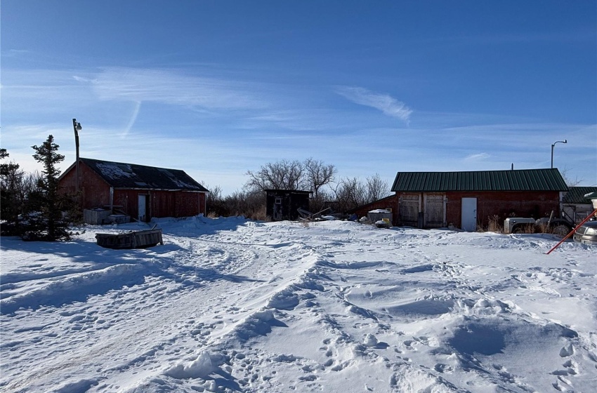 View of yard layered in snow