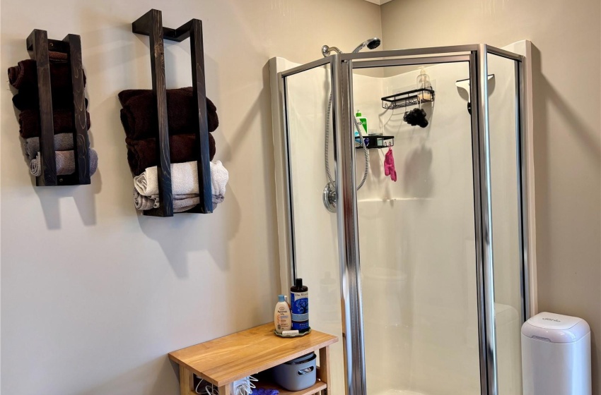 Bathroom with an enclosed shower and toilet